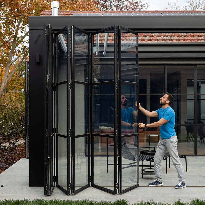 Outdoor accordion door